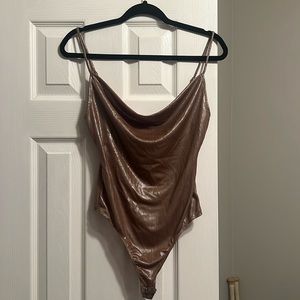 Brown shimmery body suit